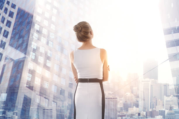 istock Businesswoman looking at city 1035729294