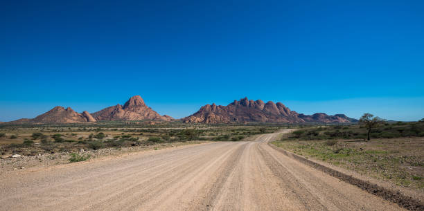 istock Spitzkoppe, unique rock formation in Damaraland, Namibia 1035730056