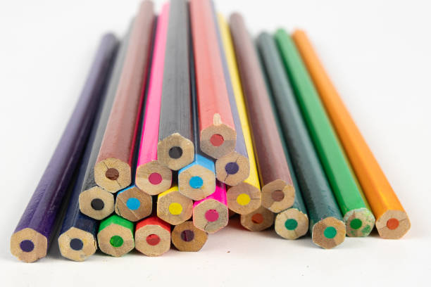 istock Pencil crayons on a white table. School supplies used in art lessons. 1035733298