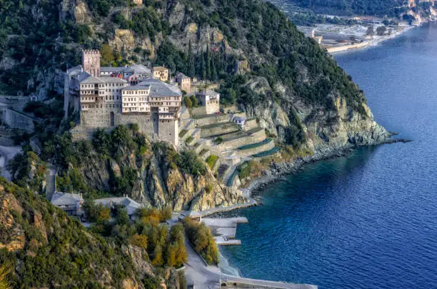 Photo of Athos peninsula, Greece. The Monastery of Dionysiou located in the Monks Republic on the peninsula of Athos.