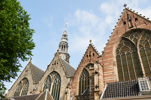 Detail fo the Oude Kerk, Old Church in English, the oldest building in town. Amsterdam. Netherlands.