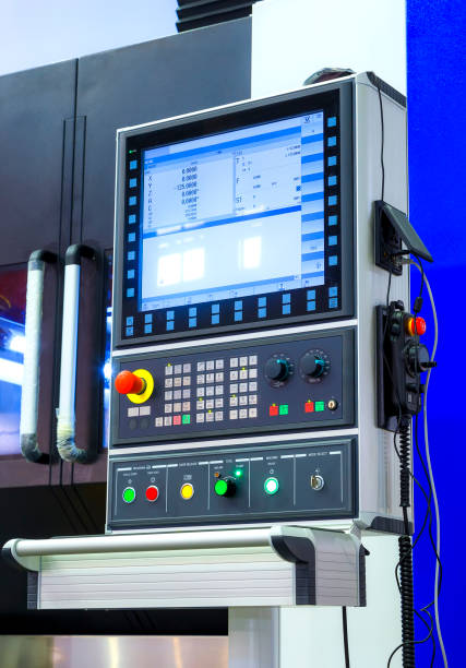 istock Close up of control panel of CNC machine with adjustment controls and push buttons 1035751616