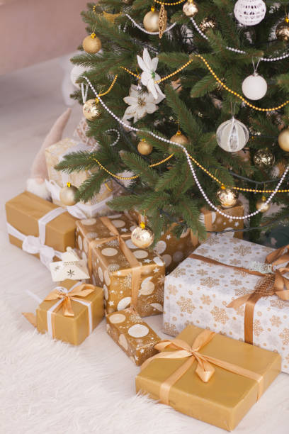 istock Gifts and presents under the Christmas tree. 1035756498