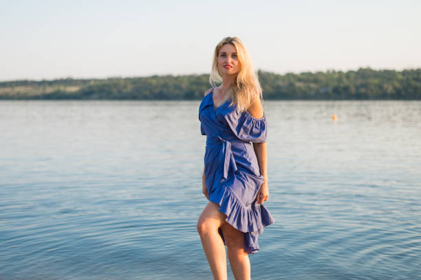 istock Happy young woman outdoors, free space. 1035772020