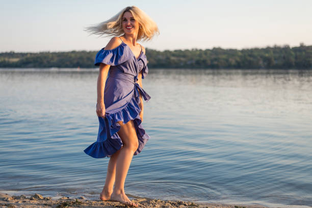 istock Happy young woman outdoors, free space. 1035772024