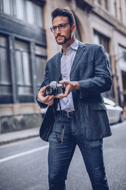 istock Gentleman taking pictures 1035777756