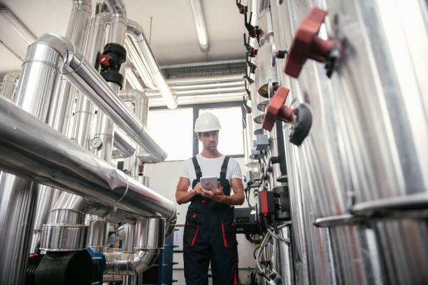 istock Man working in a boiler room 1035778490