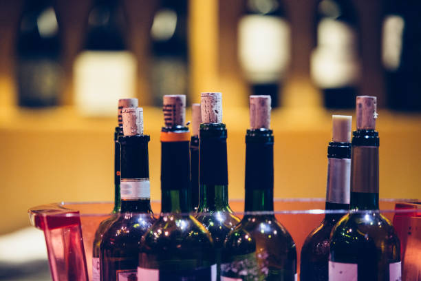 istock Close up of opened wine bottles 1035778542
