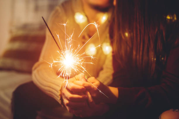 istock Couple with sparklers 1035783114