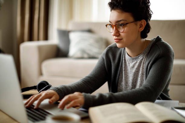 Young woman working at home