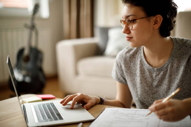 istock Young woman working at home 1035790178