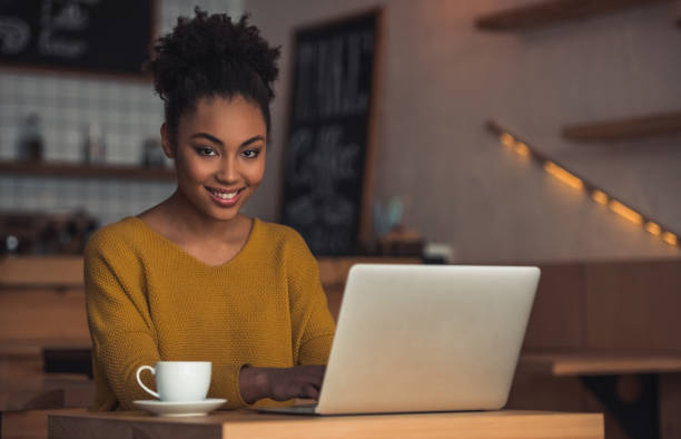 istock Afro American girl in cafe 1035796544