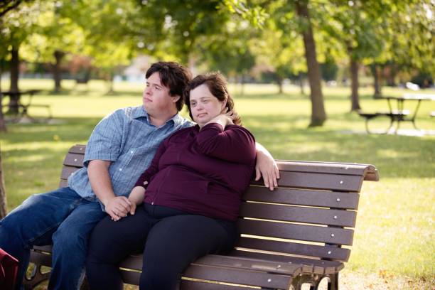 istock Couple with Down Syndrome hugging 1035801884