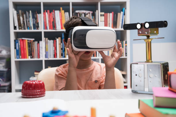 istock Portrait of Little Boy Using Virtual Reality Headset 1035801886