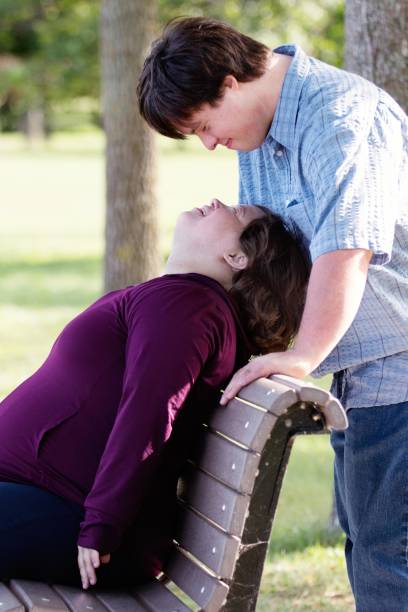 istock Couple with Down Syndrome hugging 1035803056