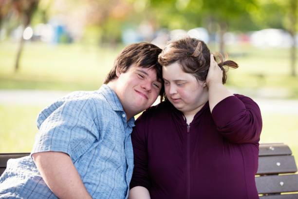 istock Couple with Down Syndrome hugging 1035803964