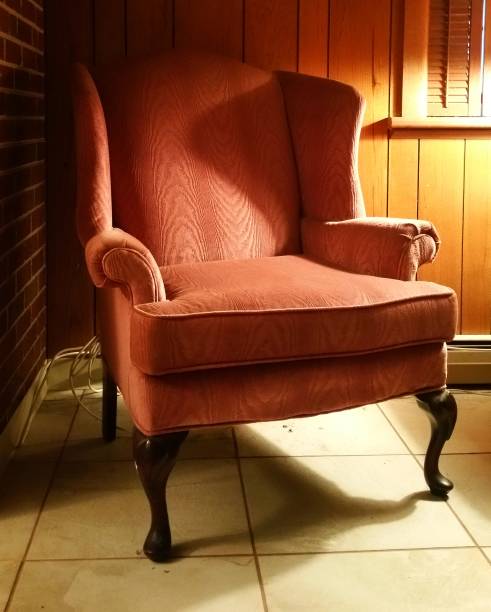 istock Mauve Armchair in Corner. 1035809326