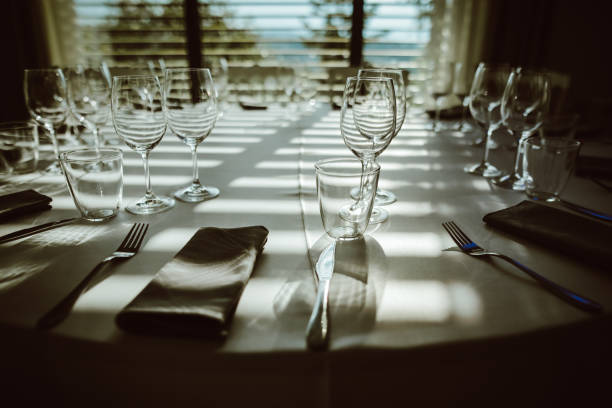 istock Nice laid table with wine glasses, napkin, and silverware 1035816284