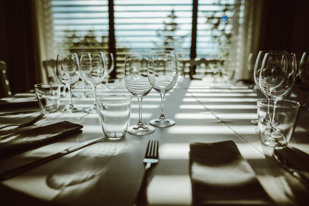 istock Nice laid table with wine glasses, napkin, and silverware 1035816312