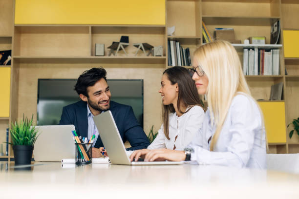 istock Young business people working in modern office 1035816530