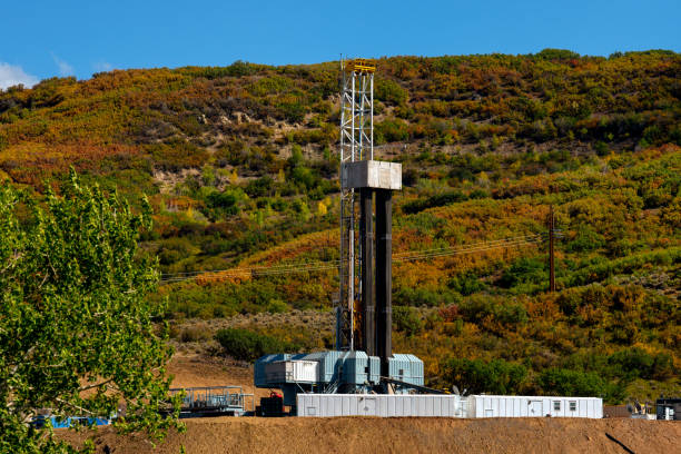 istock Fracking Drilling Rig in the Autumn Mountains of Colorado 1035816786