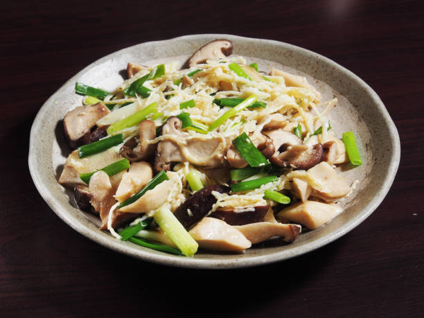 istock Fried areca tender shoot with mushrooms 1035837850