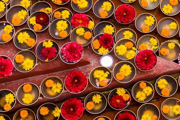 istock Close-up on Buddhist flower offerings in bowls. 1035840542