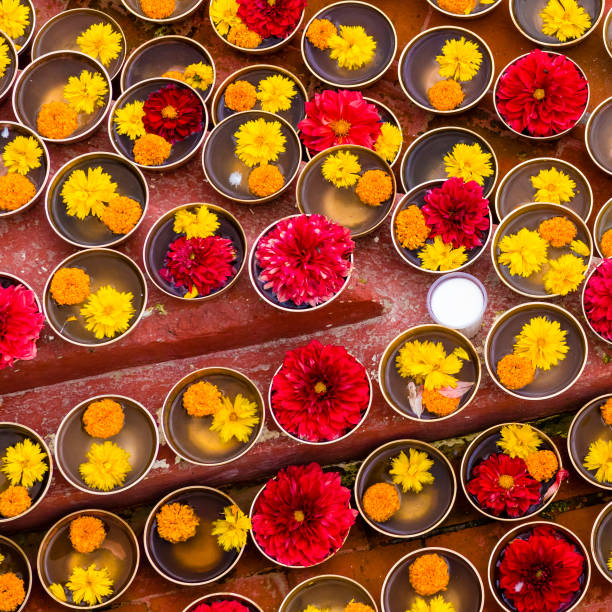 istock Close-up on Buddhist flower offerings in bowls. 1035840620