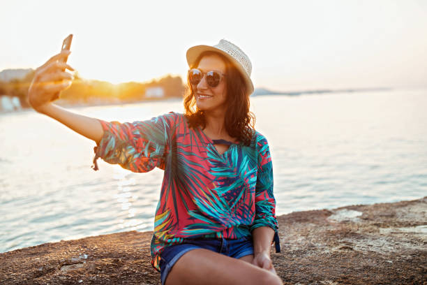 istock Woman Making Selfie At Dock 1035844778
