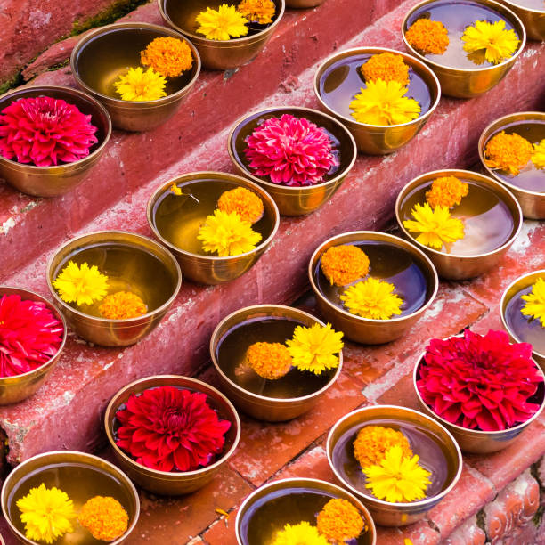 istock Close-up on Buddhist flower offerings in bowls. 1035845204