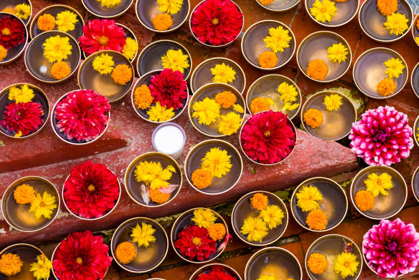 istock Close-up on Buddhist flower offerings in bowls. 1035845290
