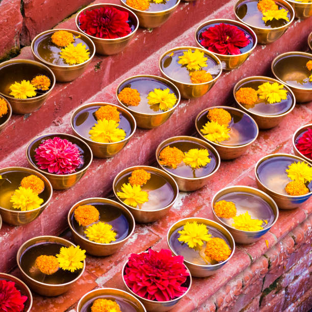 istock Close-up on Buddhist flower offerings in bowls. 1035845500