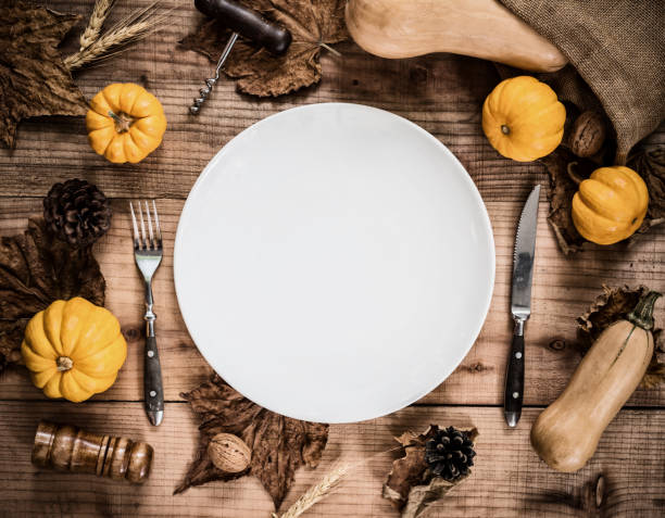 istock Happy Thanksgiving day. Without Roasted chicken and turkey. Empty white plate with pumpkin decoration. 1035852754