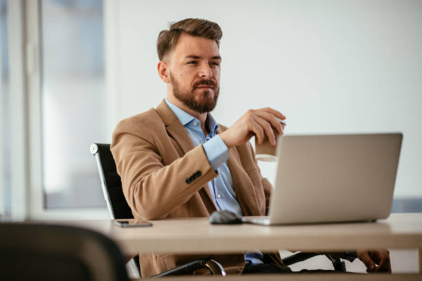 istock Businessman in office 1035864860