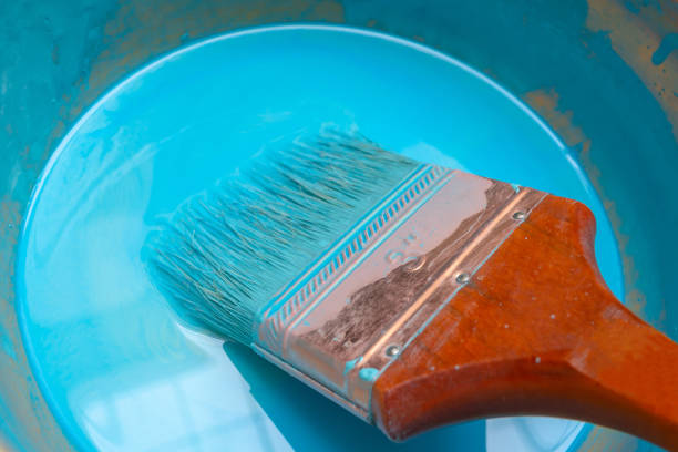 istock Paint brush and paint bowl 1035881366