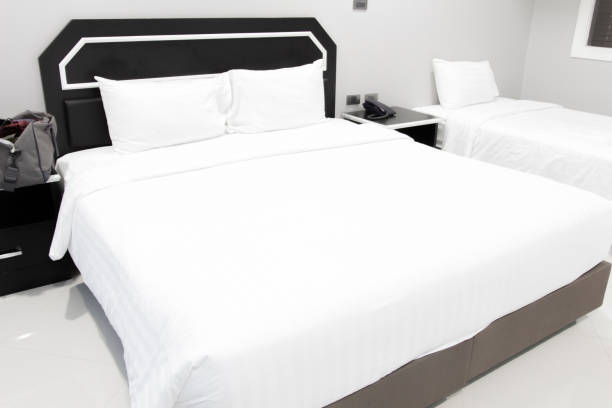 istock White pillows on a bed Comfortable soft pillows on the bed. 1035892854