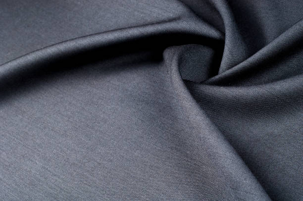 istock Background texture, pattern. cloth wool suit gray. A genuine flannel is always made of carded yarn, carded flannel is ideal in the cold months of the year, it is heavy, cozy and soft. 1035910512