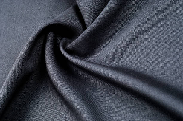 istock Background texture, pattern. cloth wool suit gray. A genuine flannel is always made of carded yarn, carded flannel is ideal in the cold months of the year, it is heavy, cozy and soft. 1035910562