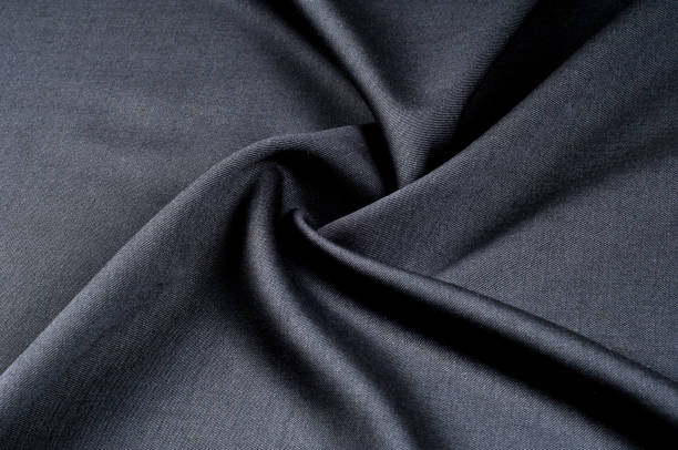 istock Background texture, pattern. cloth wool suit gray. A genuine flannel is always made of carded yarn, carded flannel is ideal in the cold months of the year, it is heavy, cozy and soft. 1035910564