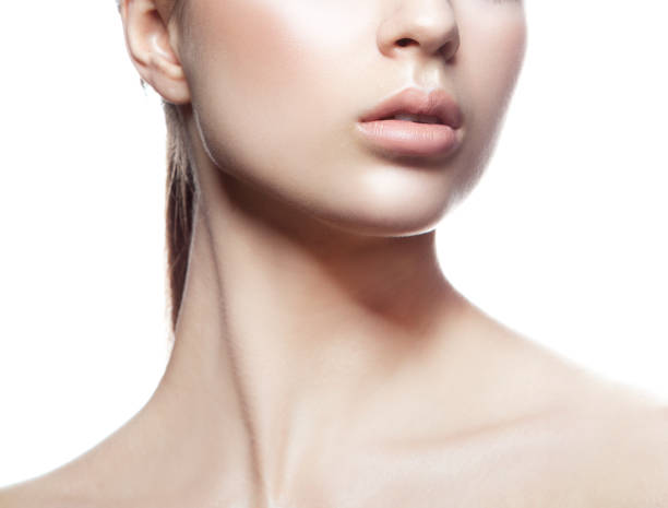 Lips and part of face and body of beauty model girl. stock photo