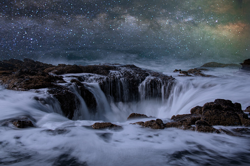 Stars over a Natural Drain Hole in the ocean on the Oregon Coast near Yachats.