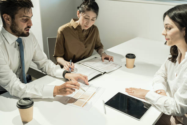 istock International business people talking about a new project 1035921698
