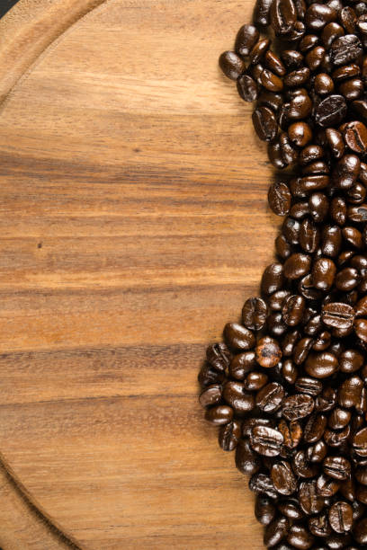 coffee bean on cutting board stock photo