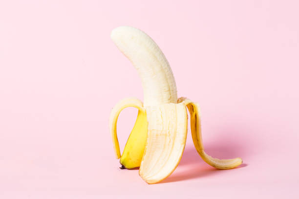 istock Erotic Fruit , Banana covered with chocolate and colourful sprinkles 1035935916