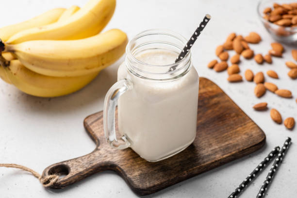 istock Banana protein smoothie in drinking glass 1035941188
