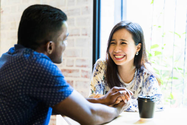 istock Young couple on a date at a cafe 1035944240