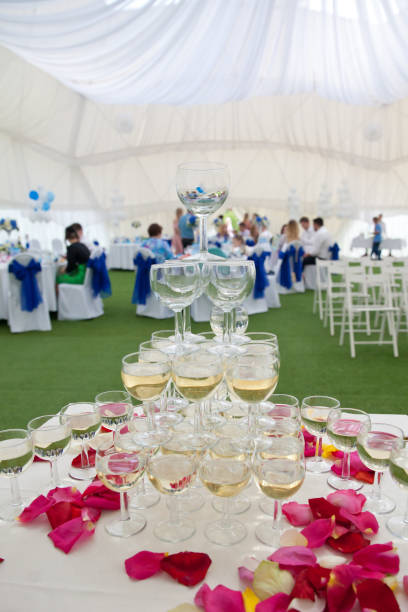 istock a pyramid of wine glasses with champagne 1035949940