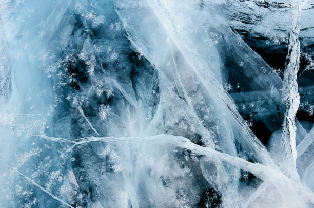 istock Blue cracked surface of the ice surface 1035952658