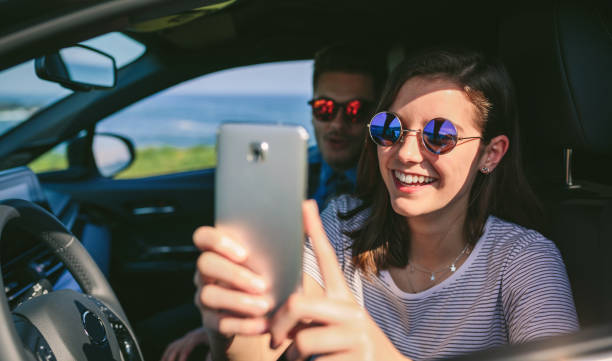 istock Girl with her boyfriend taking a selfie 1035956668