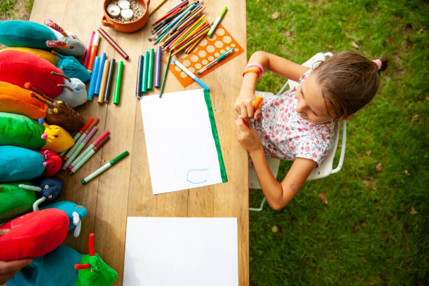 Young Girl Drawing at Summer Art's Class